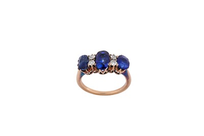 Lot 171 - A sapphire and diamond ring Set with three...