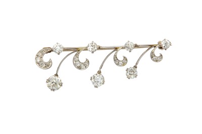 Lot 238 - A diamond brooch The knife-edge bar set with...