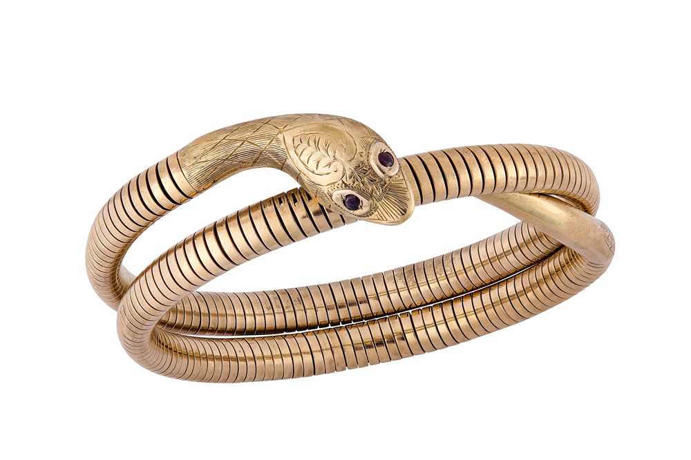 Lot 186 - A gold snake bangle Designed as a 9 carat