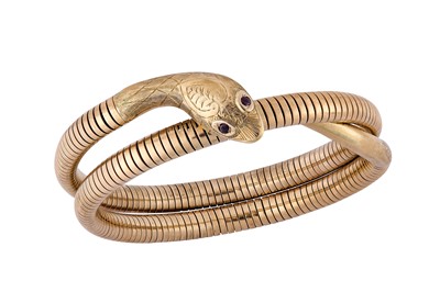 Lot 186 - A gold snake bangle Designed as a 9 carat gold...