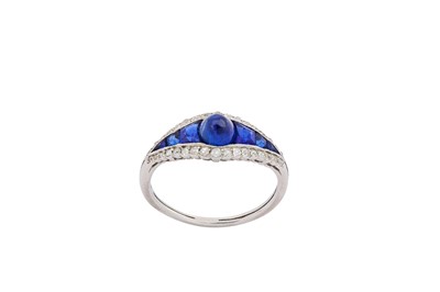 Lot 256 - A sapphire and diamond ring, circa 1915 Set...