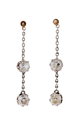 Lot 194 - A pair of diamond pendent earrings The...