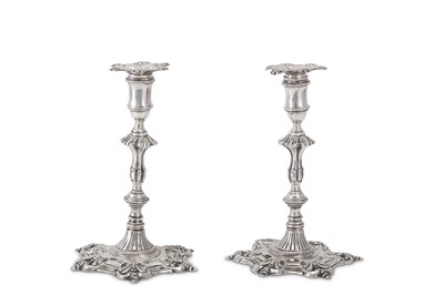 Lot 240 - A pair of Victorian sterling silver taper...