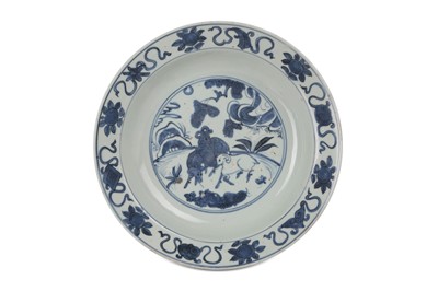 Lot 18 - A CHINESE BLUE AND WHITE 'THREE RAMS' DISH....