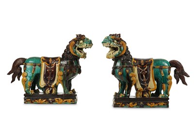 Lot 51 - A PAIR OF MASSIVE CHINESE SANCAI LION DOGS....