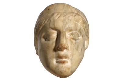 Lot 134 - ROMAN MARBLE HEAD OF A WOMAN Circa 3rd - 4th...