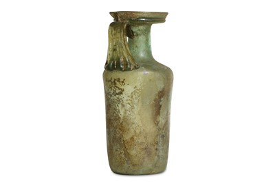 Lot 149 - A ROMAN GREEN GLASS JUG Circa 4th - 5th...