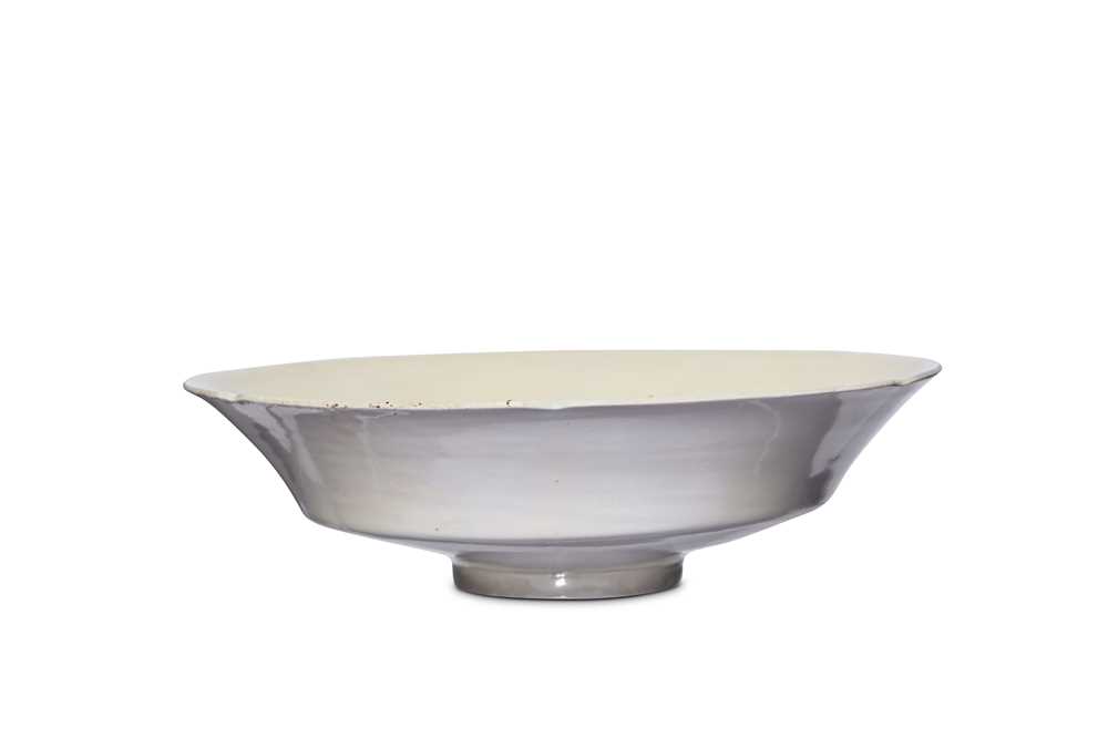 Lot 86 - A CHINESE DINGYAO LOBED BOWL. Song Dynasty....
