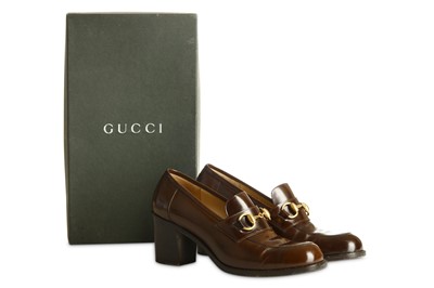 Lot 467 - Gucci Brown Heeled Loafers, shiny leather body...