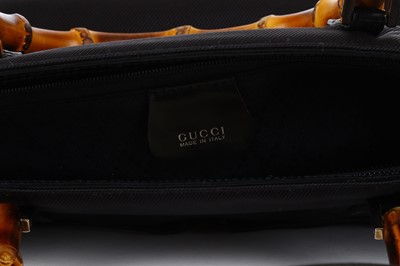 Lot 130 - Gucci Black Nylon Bamboo Bag, black nylon body...