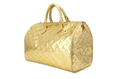 Lot 59 - Louis Vuitton Limited Edition Gold Speedy...
