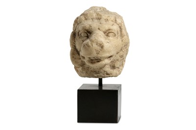 Lot 135 - A GREEK MARBLE HEAD OF A LION Circa 4th...