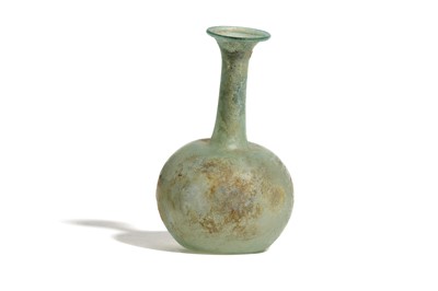 Lot 145 - A ROMAN GLASS UNGUENTARIUM Circa 2nd - 4th...