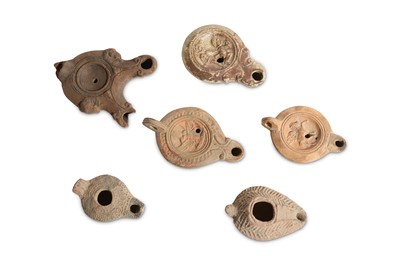 Lot 101 - SIX TERRACOTTA OIL LAMPS Circa 1st - 4th...