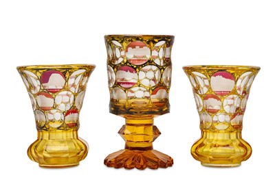Lot 42 - A PAIR OF BOHEMIAN AMBER-STAINED GLASS BEAKERS...