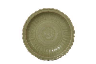 Lot 234 - A CHINESE LONGQUAN CELADON CHARGER. Ming...