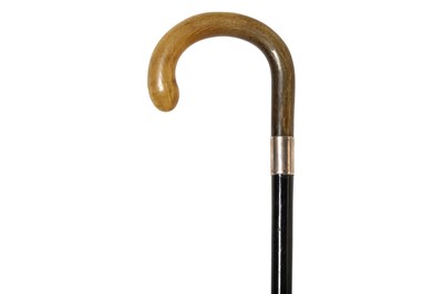 Lot 448 - A WALKING STICK WITH A RHINOCEROS HANDLE....
