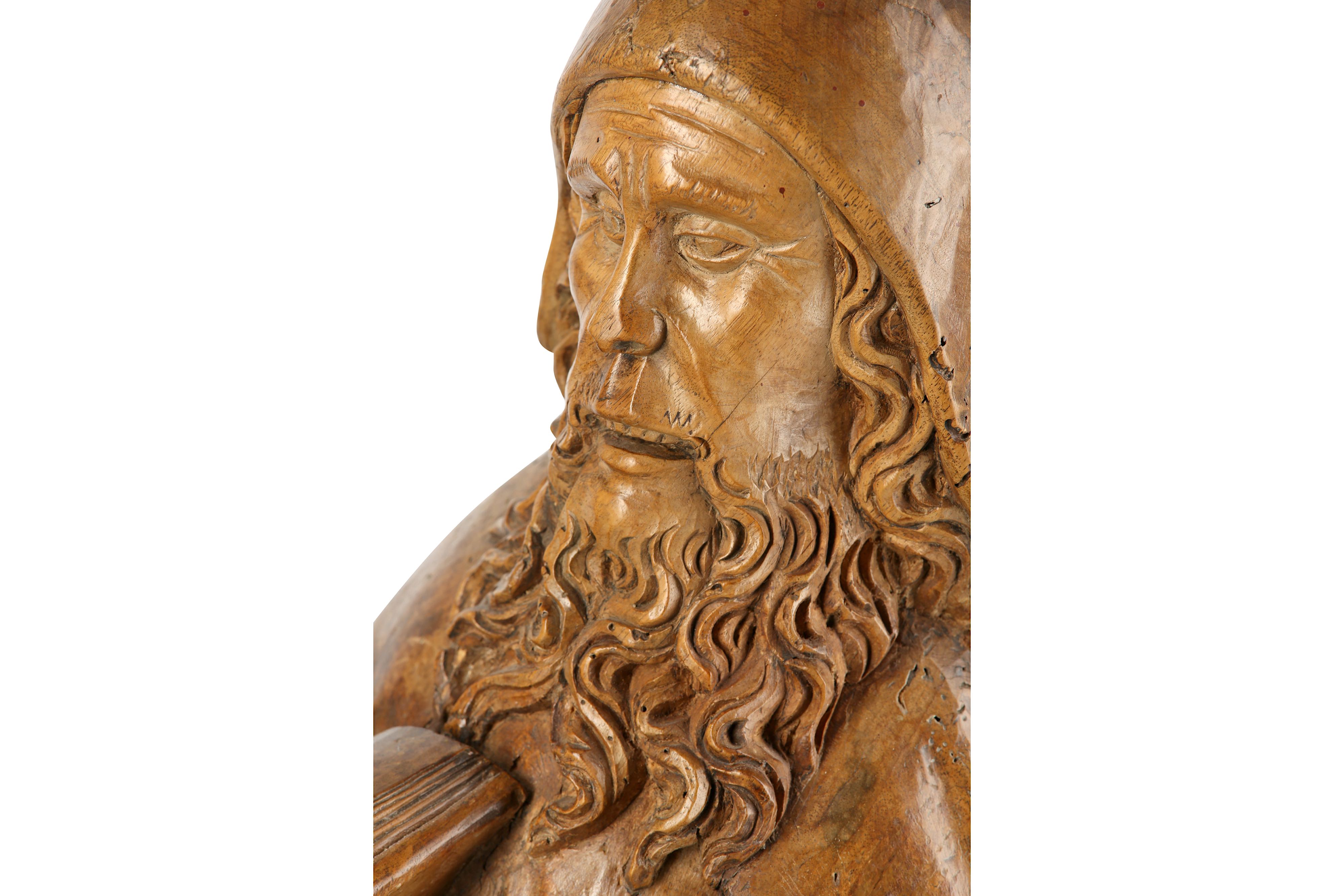 Lot 156 - A LATE 15TH CENTURY GERMAN CARVED WALNUT