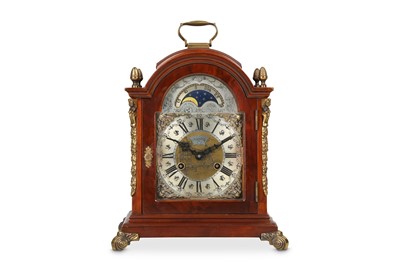 Lot 69 - A GEORGE III STYLE MAHOGANY AND BRASS MOUNTED...