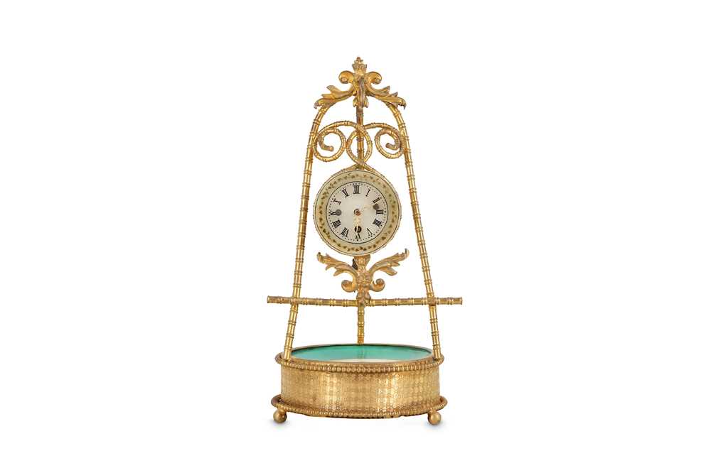 Lot 33 - A SMALL EARLY 20TH CENTURY GILT BRASS AND...