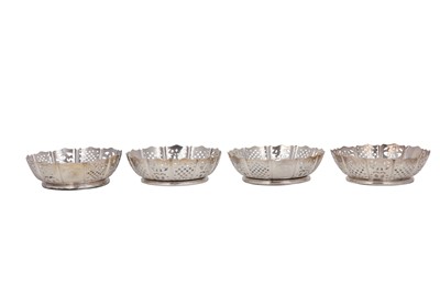 Lot 53 - A set of four Victorian silver plated wine...