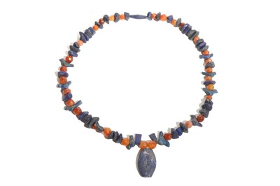 Lot 52 - A LAPIS LAZULI AND CARNELIAN NECKLACE Circa...