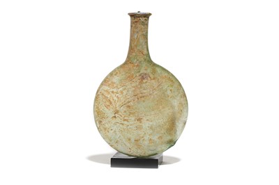 Lot 167 - A ROMAN GREEN GLASS PILGRIM FLASK Circa 2nd -...