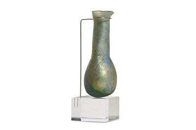 Lot 141 - A ROMAN GREEN GLASS UNGUENTARIUM Circa 3rd...