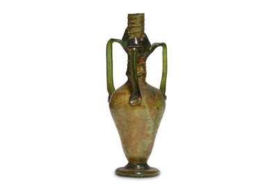 Lot 123 - A ROMAN GREEN GLASS FOUR-HANDLED FLASK Circa...