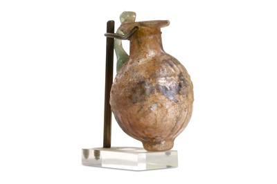 Lot 132 - A ROMAN GLASS FLASK Circa 3rd Century A.D. The...