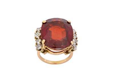 Lot 35 - A hessonite garnet and diamond ring The...