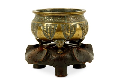 Lot 323 - A Chinese cast bronze incense burner, raised...