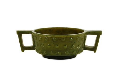 Lot 290 - A Chinese spinach jade double handled cup,...