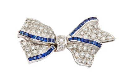 Lot 245 - A diamond and sapphire brooch Of bow design,...