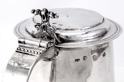 Lot 234 - A Charles II sterling silver tankard, London...