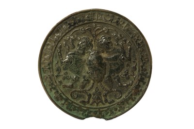 Lot 29 - A SELJUQ CAST BRONZE MIRROR  Iran or Anatolia,...