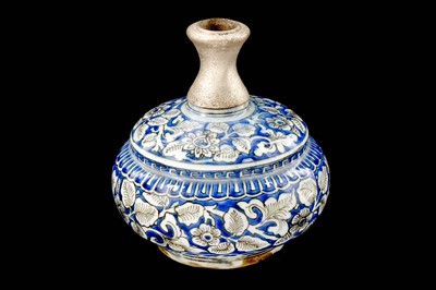 Lot 217 - A SAFAVID BLUE AND WHITE POTTERY VASE Iran,...