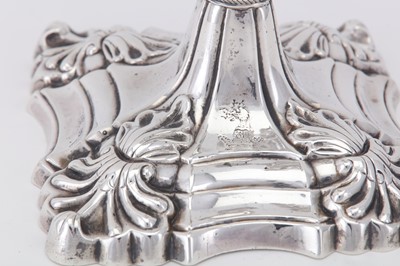 Lot 106 - An early George III sterling silver candlestick, London 1762 by Ebenezer Coker (reg. 27th March 1738)