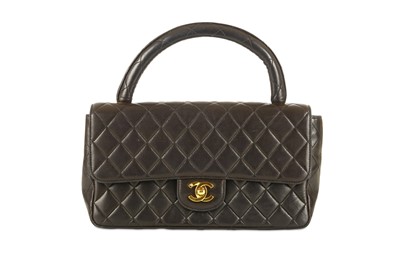 Lot 410 - Chanel Black Kelly Handbag, c. 1991-94,...