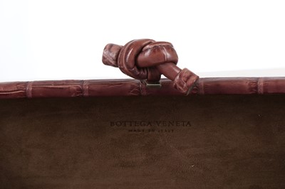 Lot 224 - Bottega Veneta Crocodile Knot Stretch Clutch,...