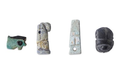 Lot 16 - A GROUP OF EGYPTIAN FRIT AMULETS Late Period,...