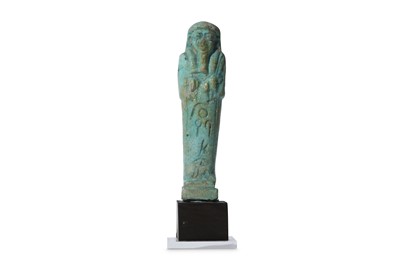 Lot 8 - AN EGYPTIAN GLAZED COMPOSITION SHABTI 26th...