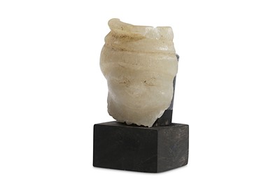 Lot 6 - AN EGYPTIAN CALCITE FACE Middle Kingdom, 12th...