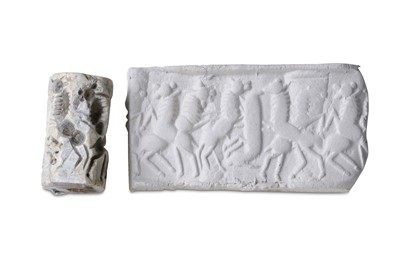 Lot 51 - A SUMERIAN STEATITE CYLINDER SEAL First half...