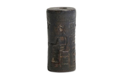 Lot 50 - A MESOPOTAMIAN BRONZE CYLINDER SEAL Possibly...