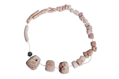 Lot 3 - A PREDYNASTIC EGYPTIAN SHELL BRACELET Naqada I,...