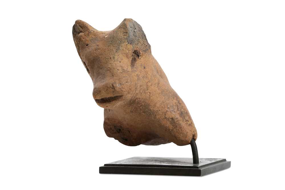 Lot 58 - A NEOLITHIC GREEK PROTOME OF A BULL Circa 5th