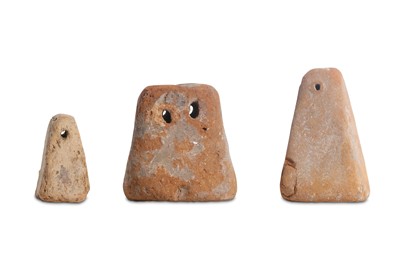 Lot 22 - THREE LARGE ROMANO-EGYPTIAN TERRACOTTA WEIGHTS...