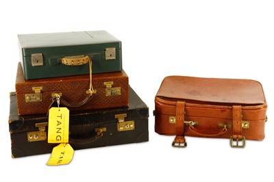 Lot 105 - A group of four vintage leather suitcases to...