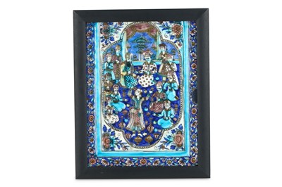 Lot 280 - A QAJAR MOULDED POTTERY TILE WITH A BANQUET...